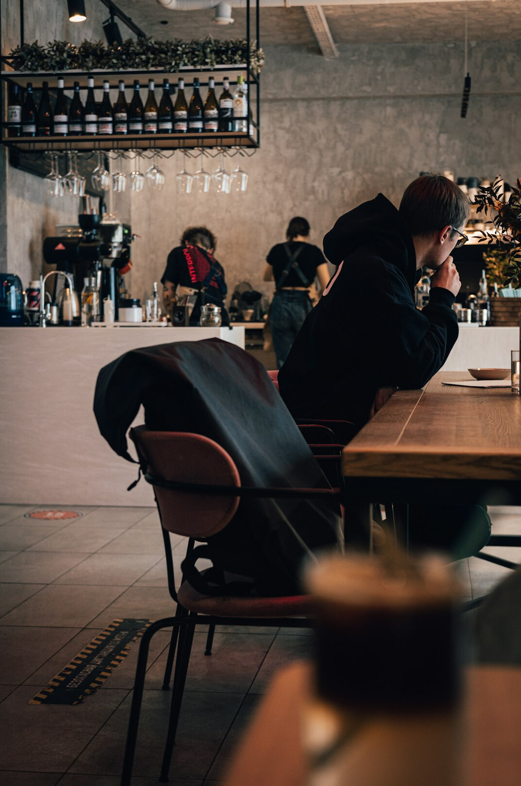 People in a meeting discussing at a table