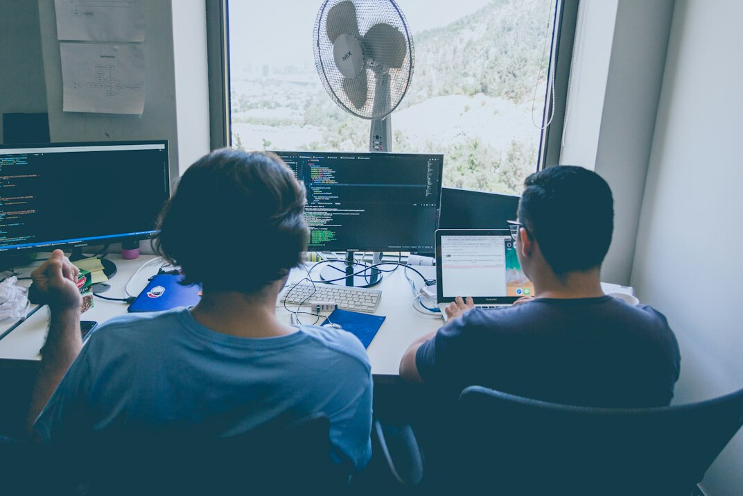 group of programmers collaborating