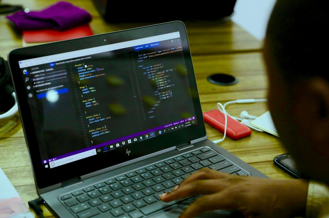 group of adults in coding class