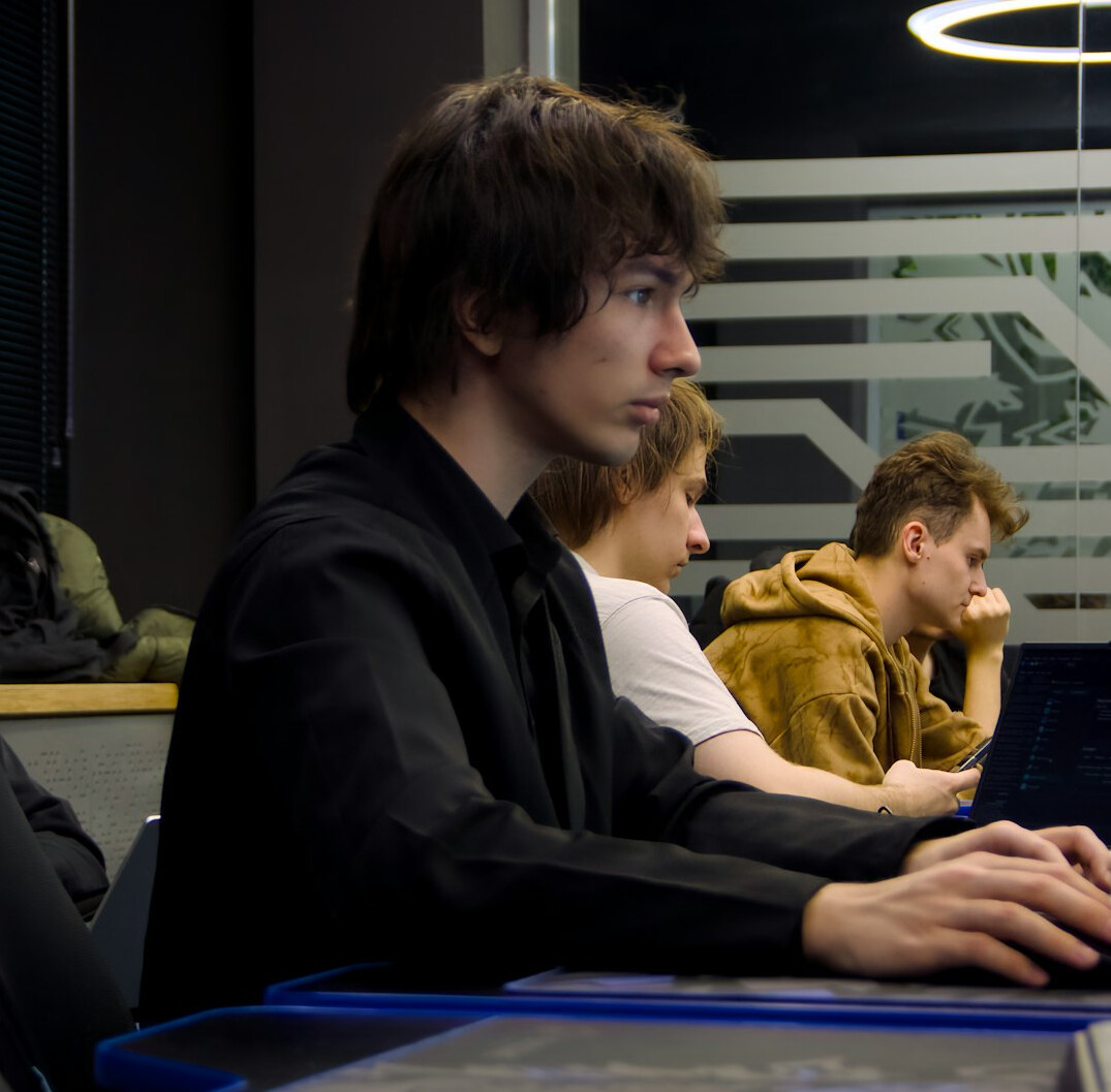 students learning programming in classroom